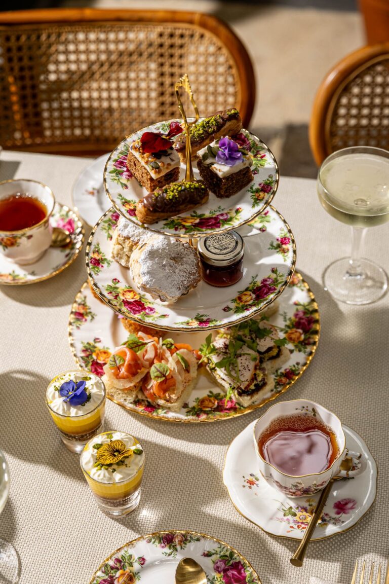 An afternoon tea stand of cakes and savouries, The Greenhouses