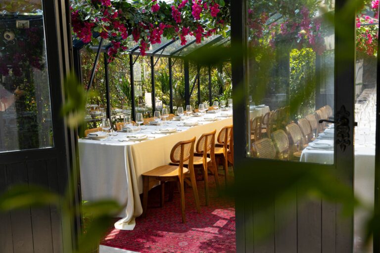 The dressed table seen through the open glasshouse door, The Greenhouses