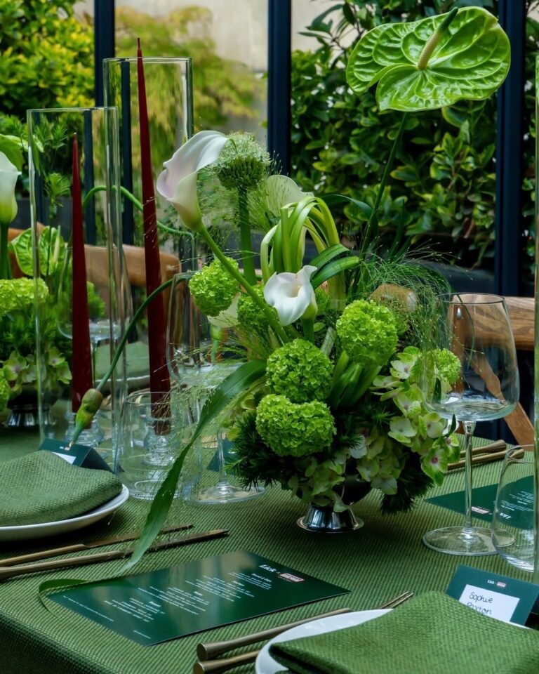 A green and white centrepiece on the dressed table, The Greenhouses