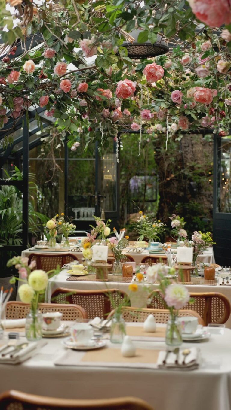 The table laid for afternoon tea beneath the blossom, The Greenhouses