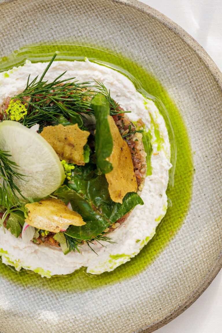 A plated dish, herb oil and labneh, The Greenhouses