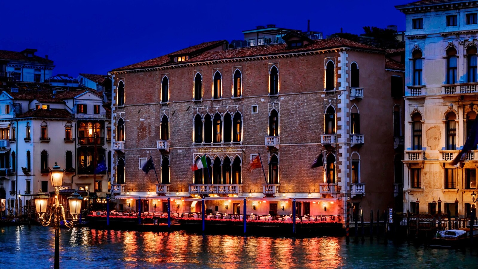 The Gritti Palace facade on the Grand Canal, its landing on the water, The Gritti Palace