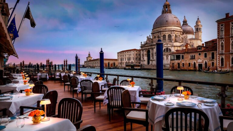 The Club del Doge terrace by day, on the water, The Gritti Palace