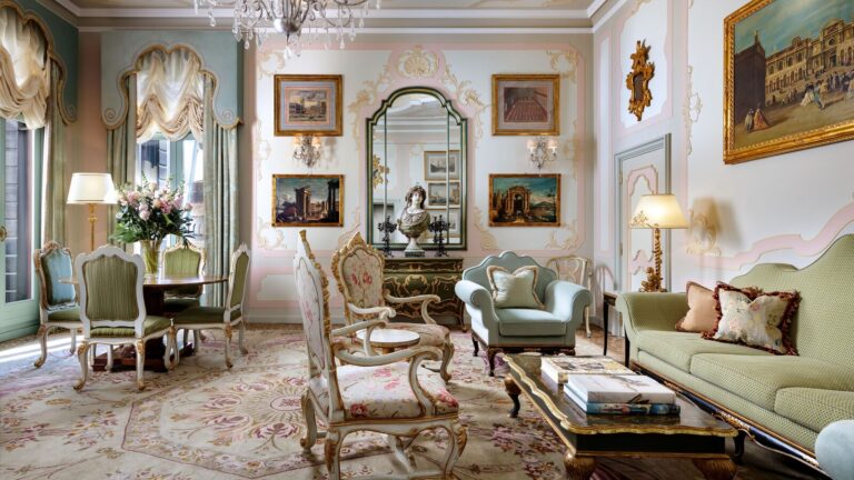 A canal-view suite bedroom overlooking the water, The Gritti Palace