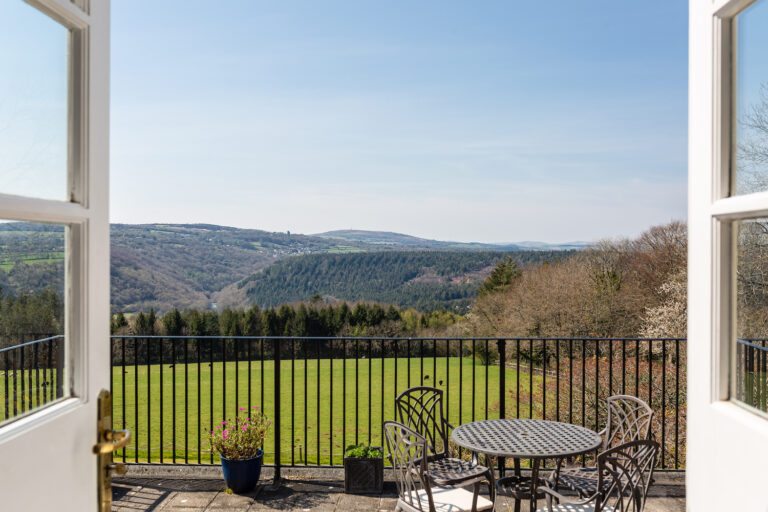 The balcony of Room 3 in the Main House, looking over the lawn and down the Tamar Valley, The Horn Of Plenty