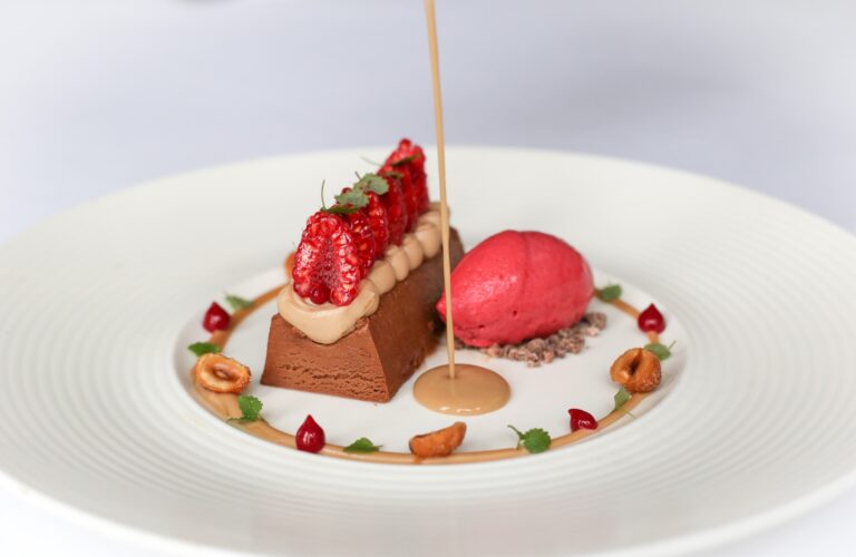 Chocolate delice with hazelnut, raspberries and raspberry sorbet, from the restaurant kitchen, The Horn Of Plenty