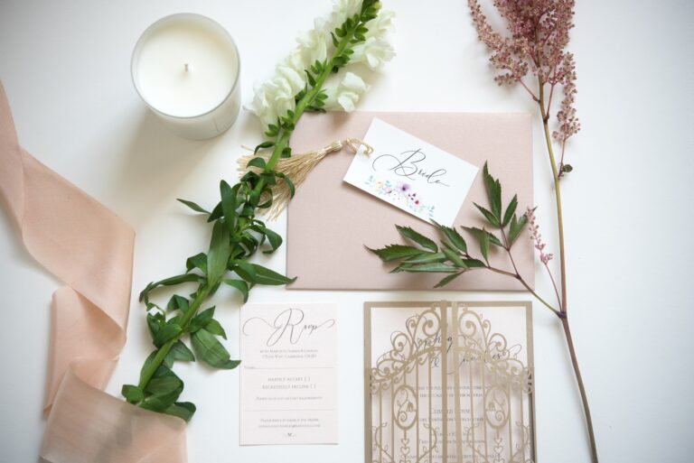 Laser cut gate invitation styled with flowers and silk ribbon, The Hummingbird Card Company