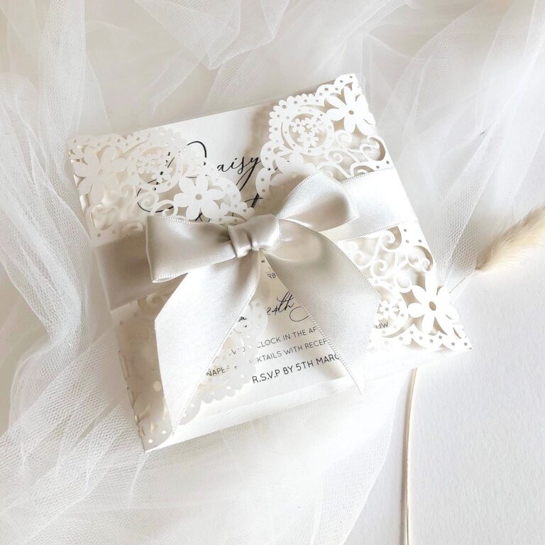 Doily lace invitation tied with a satin ribbon, The Hummingbird Card Company