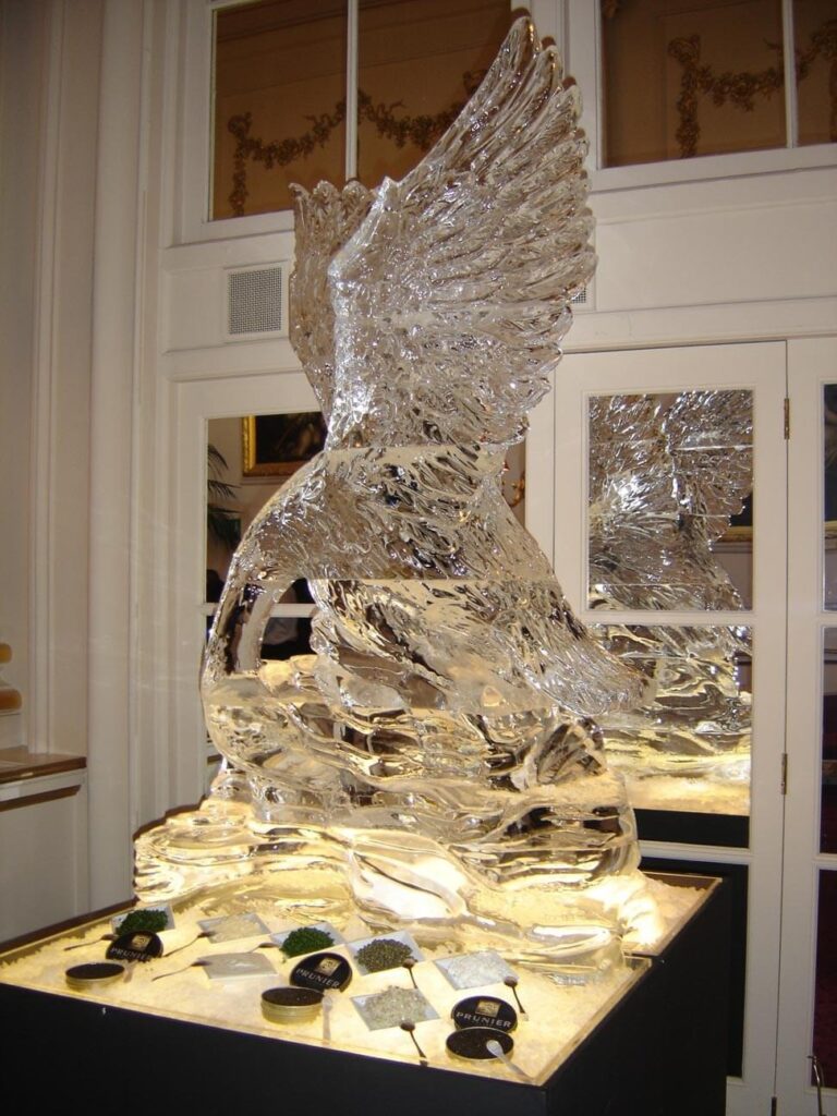 A hand-carved ice swan on a caviar display, The Ice Box