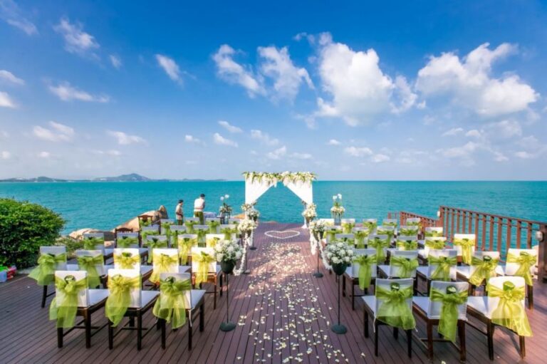 Ceremony chairs and floral arch laid out on the sea-facing deck, The Kala Samui