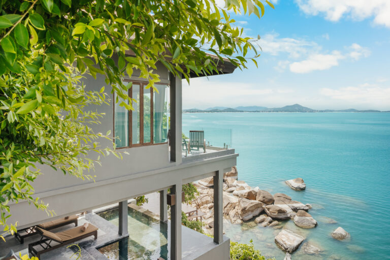 Villa balcony on the hillside with the sea beyond, The Kala Samui