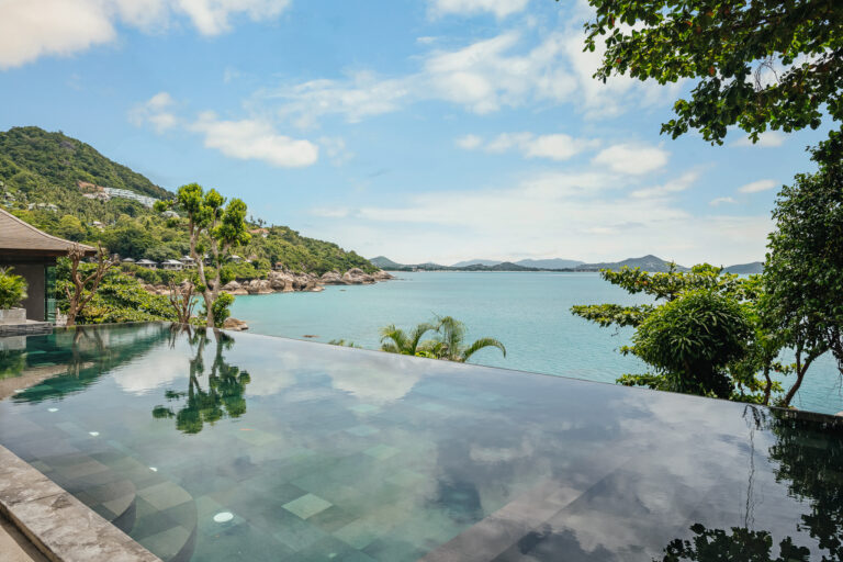 The infinity pool edge with views across the bay, The Kala Samui