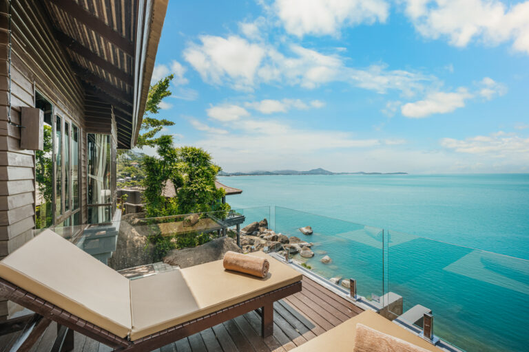 Sun lounger on a terrace overlooking the sea, The Kala Samui