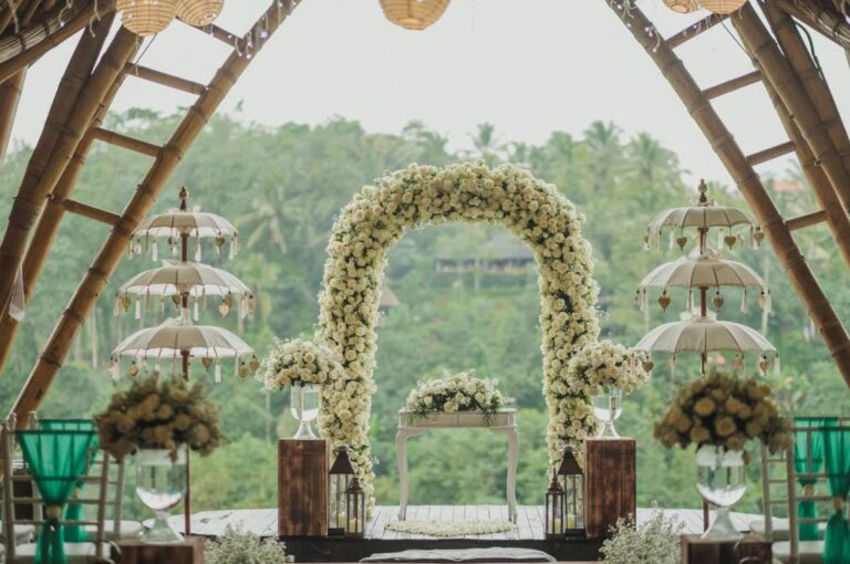 Puspaka Sky Wedding Chapel with a flower arch and the valley beyond, The Kayon Jungle Resort