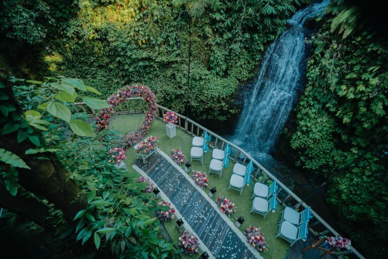 Floral aisle and ring arch at the Canyon Jetty, The Kayon Ubud Resort