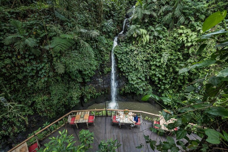Dining tables on the Canyon Jetty deck, The Kayon Ubud Resort