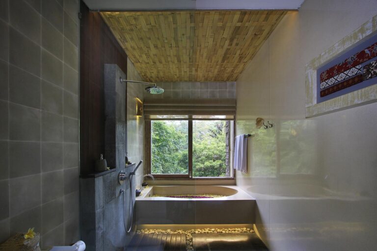 Suite bathroom with a view of the jungle, The Kayon Ubud Resort