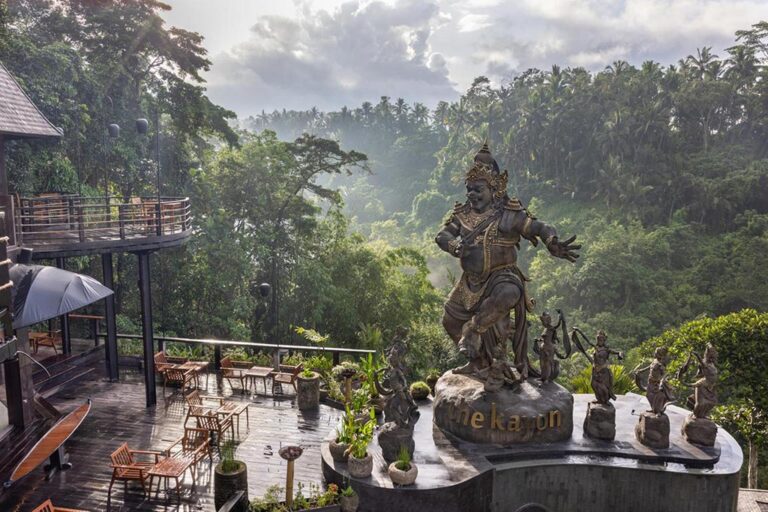 Terrace with a Balinese statue overlooking the valley, The Kayon Valley Resort Ubud