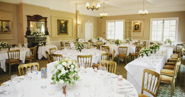 Wedding breakfast tables with floral centrepieces, The Lake Country House Hotel & Spa