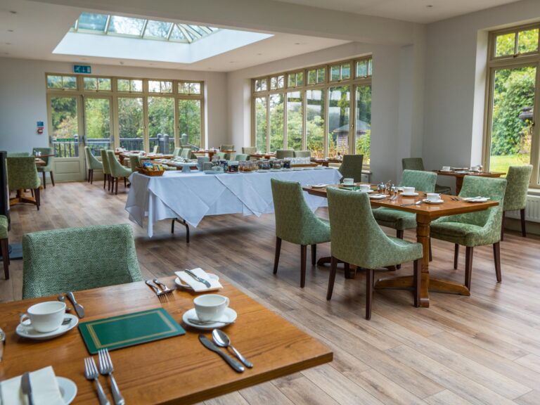 The Orangery, a light garden-view dining room, The Lake Country House Hotel & Spa