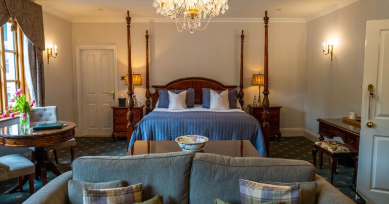 A four-poster suite, The Lake Country House Hotel & Spa