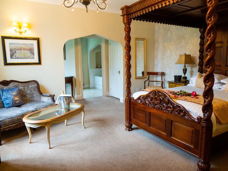 The master four-poster suite with sitting area, The Lake Country House Hotel & Spa