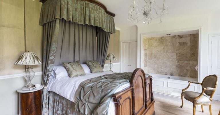 An elegant four-poster bedroom, The Lake Country House Hotel & Spa