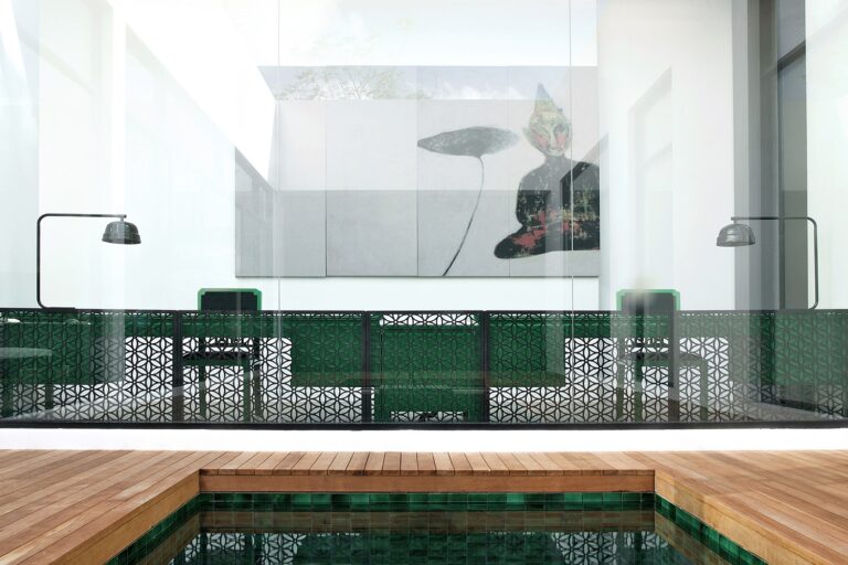 Private pool and glass-walled pavilion at a Secret Pool Villa, The Library