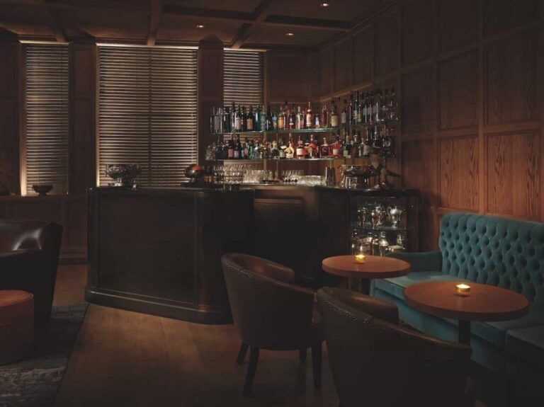 The award-winning Punch Room, an intimate wood-panelled cocktail bar, The London EDITION