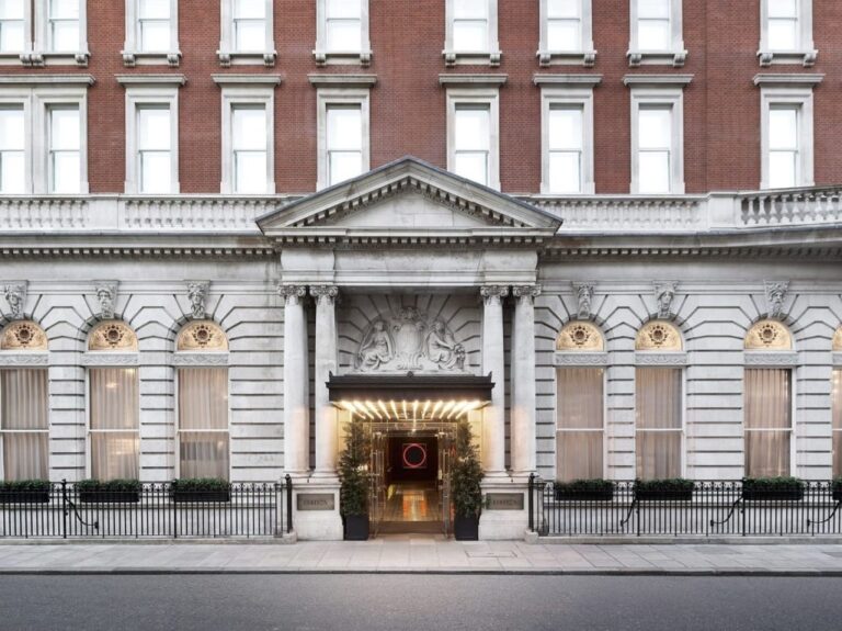 The Grade II listed Georgian portico entrance of The London EDITION, The London EDITION