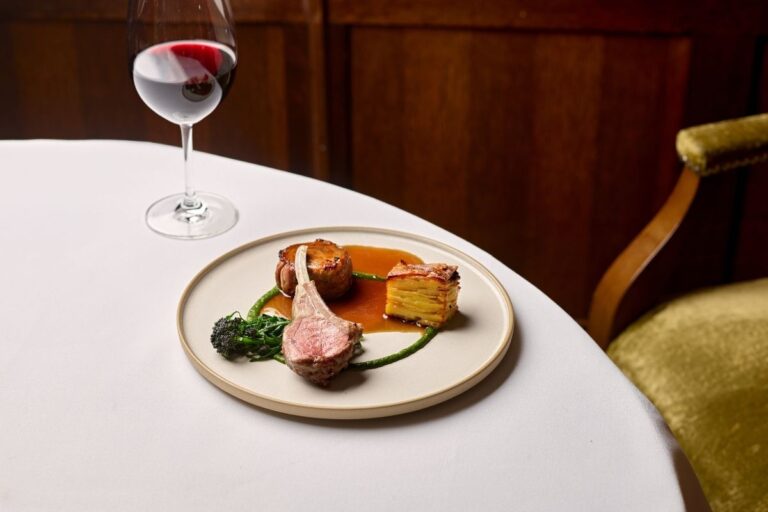 A plated main course with red wine in The Terrace Restaurant, The Montagu Arms Hotel