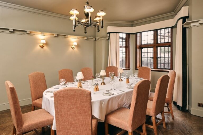 The Paris Room laid for a private dining celebration, The Montagu Arms Hotel