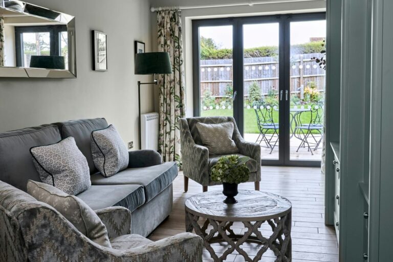 The Courtyard Suite lounge opening onto the garden terrace, The Montagu Arms Hotel