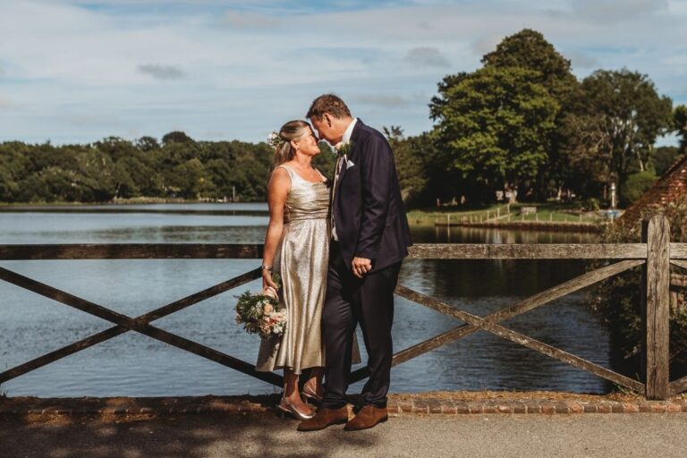 The couple on the gated bridge over the Beaulieu River, The Montagu Arms Hotel