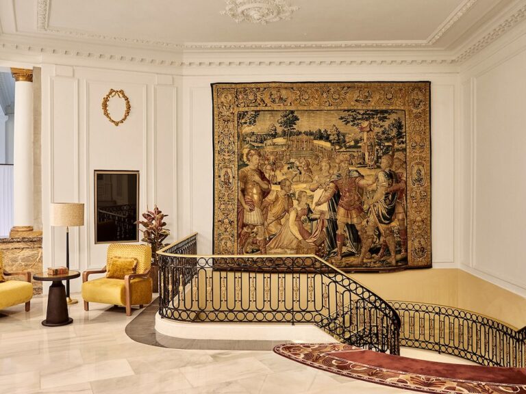 A tapestry hung above the staircase landing, The Palace, a Luxury Collection Hotel, Madrid