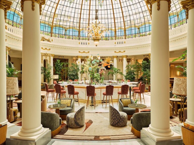 The columns and lounge seating of La Cúpula, The Palace, a Luxury Collection Hotel, Madrid