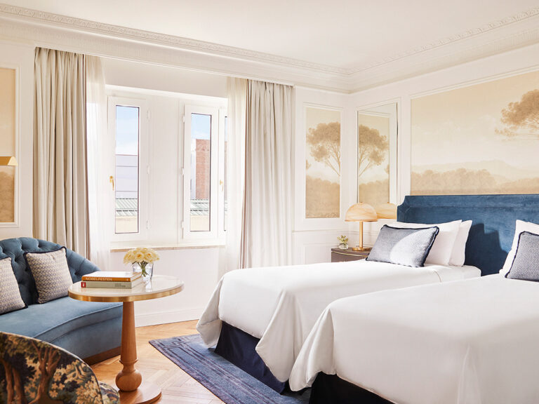 A twin bedded room with a blue velvet sofa, The Palace, a Luxury Collection Hotel, Madrid