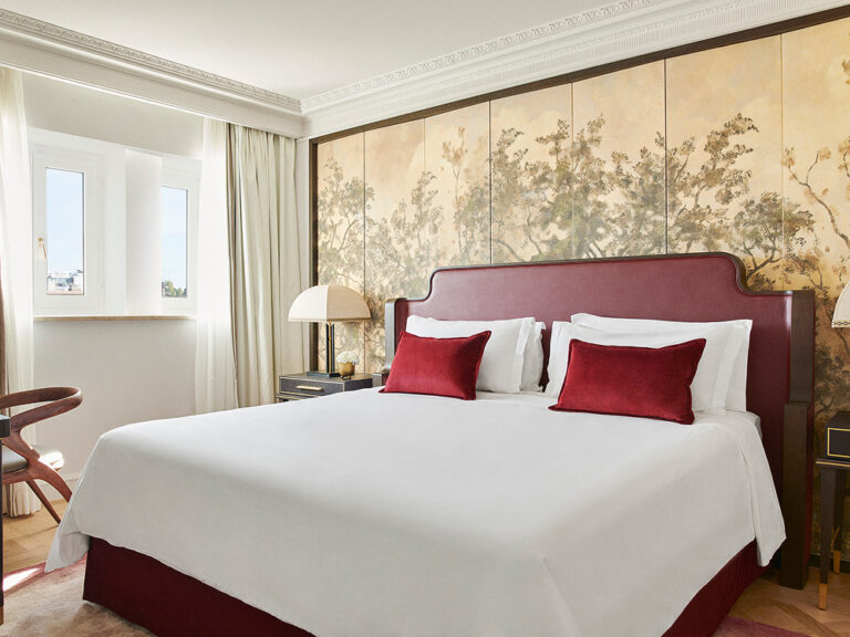 A bedroom with a burgundy headboard and a mural panel, The Palace, a Luxury Collection Hotel, Madrid