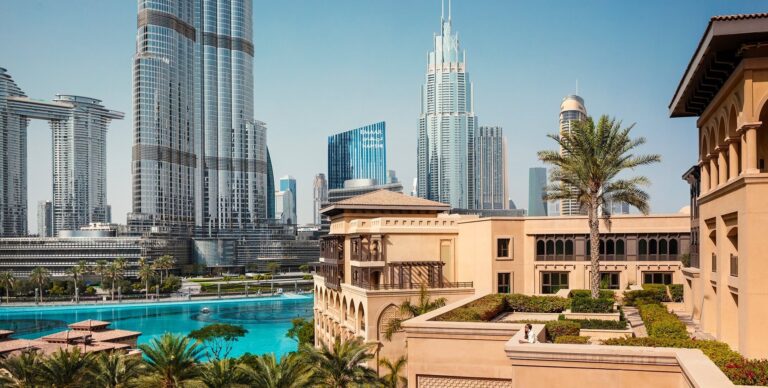 The hotel terraces and gardens beside Burj Lake, with the Burj Khalifa, The Palace Downtown Dubai