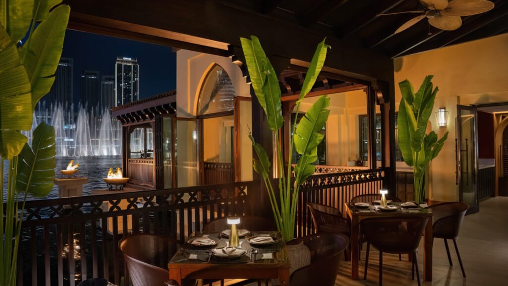 Candlelit terrace tables at Thiptara facing the fountain, The Palace Downtown Dubai