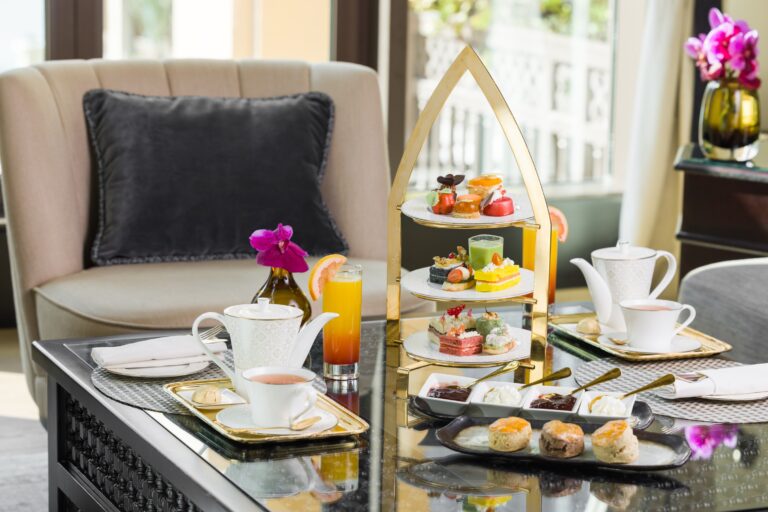 Afternoon tea served on a tiered stand at Al Bayt, The Palace Downtown Dubai