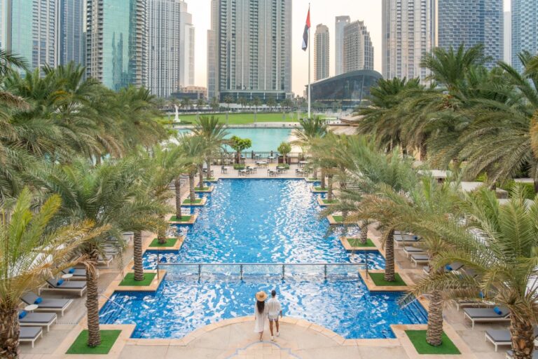 The courtyard pool seen from above, with Downtown Dubai beyond, The Palace Downtown Dubai