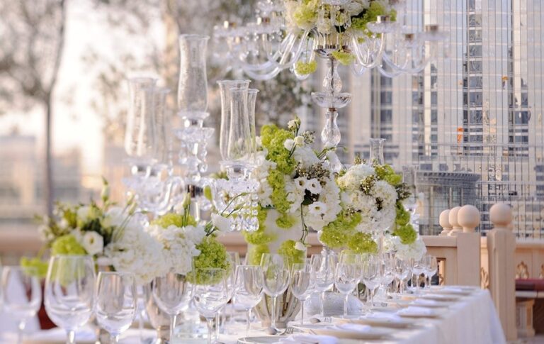 Wedding table with candelabra and white flowers on the Viewing Deck, The Palace Downtown Dubai