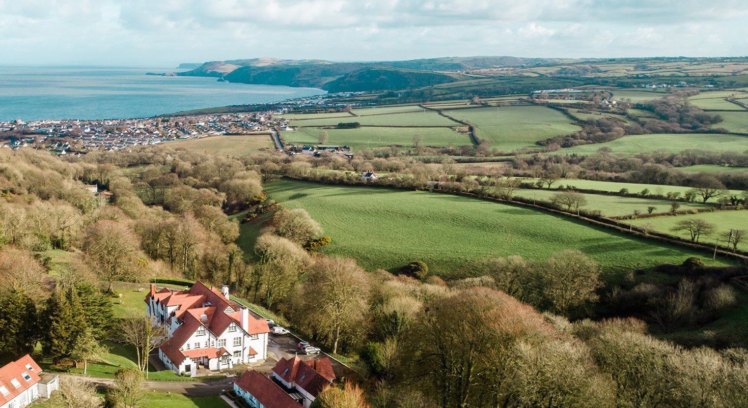 The house and the Cardigan coast from above, The Penrallt Country House Hotel