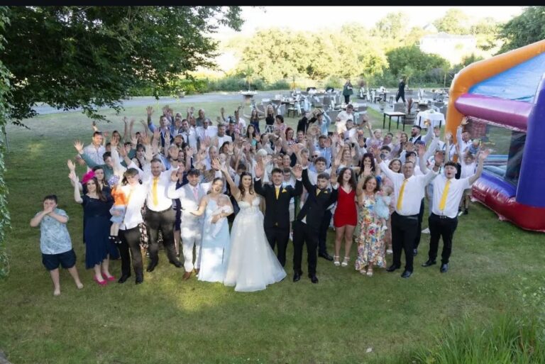 A wedding group on the lawn, The Penrallt Country House Hotel
