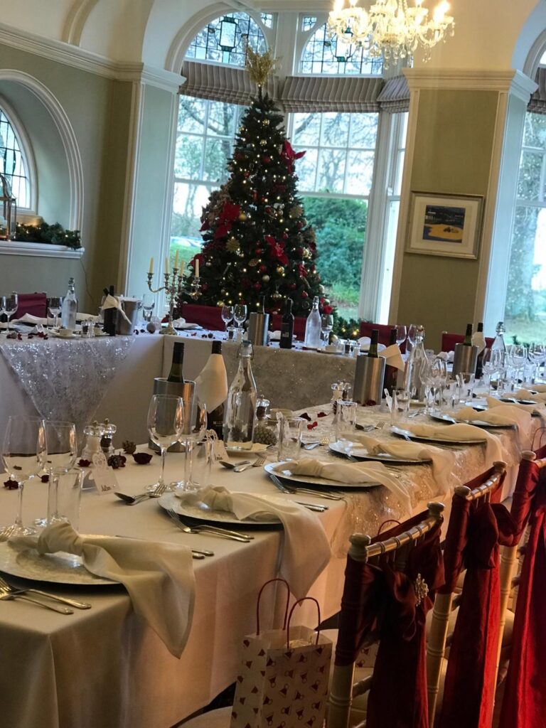 A wedding breakfast table set for a Christmas wedding, The Penrallt Country House Hotel
