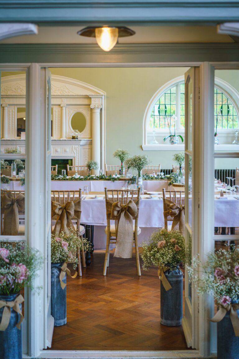 The dining room set for a wedding, seen from the doorway, The Penrallt Country House Hotel