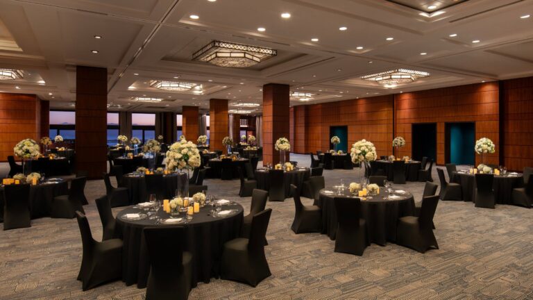 A gala dinner set beneath the chandeliers, The Ritz-Carlton, Abama
