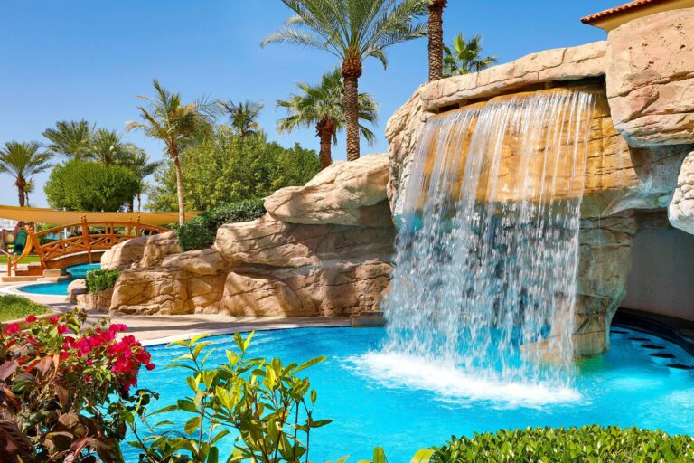 Waterfall feature beside the resort pool, The Ritz-Carlton, Dubai