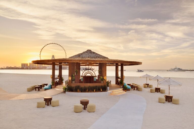 Beachfront palapa at sunset, The Ritz-Carlton, Dubai